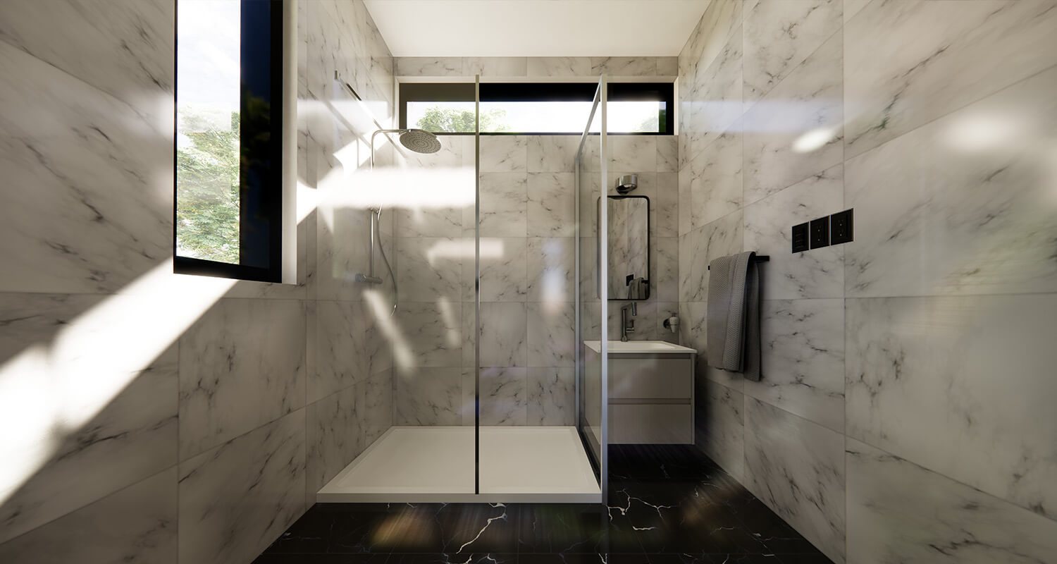Casita bathroom with floor-to-ceiling marble and a glass walk-in shower