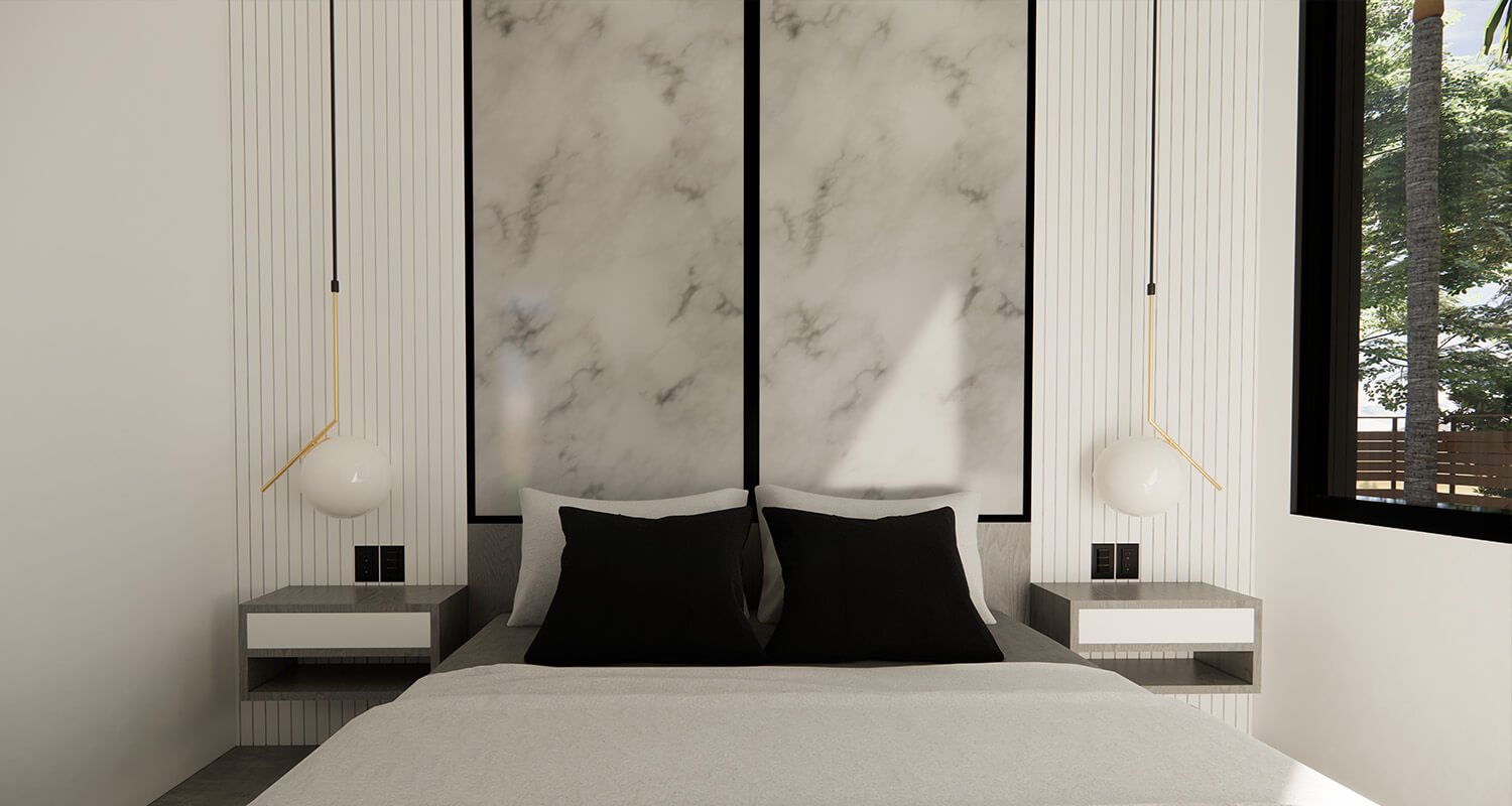 Casita bedroom with marble headboard wall, brass pendant lights and floating nightstands
